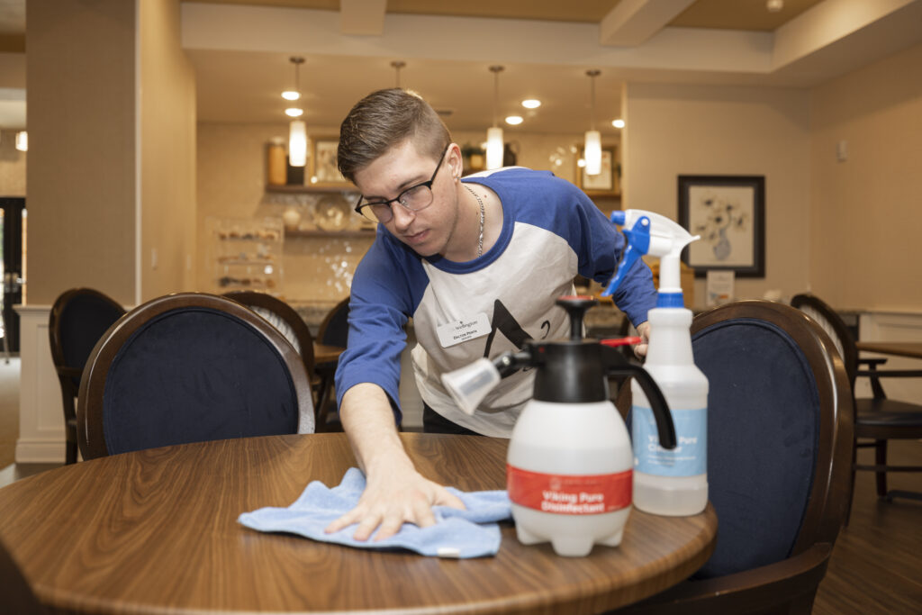 Dalton Penta with The Wellington Senior Living using the Viking Pure products on a wooden table