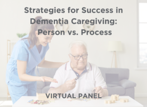 Older gentlemen with dementia at a senior living facility working on his memory with a caregiver